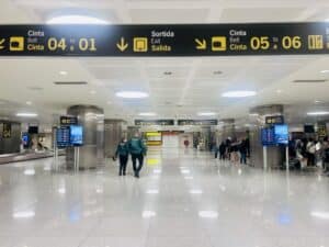 Menorca airport terminal, where travelers can watch Love Island All Stars Episode 3 on Dailymotion while waiting for their flight